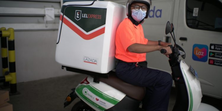 Kampanye Langkah Hijau, Grab Sediakan Armada Motor Listrik untuk Kurir Lazada